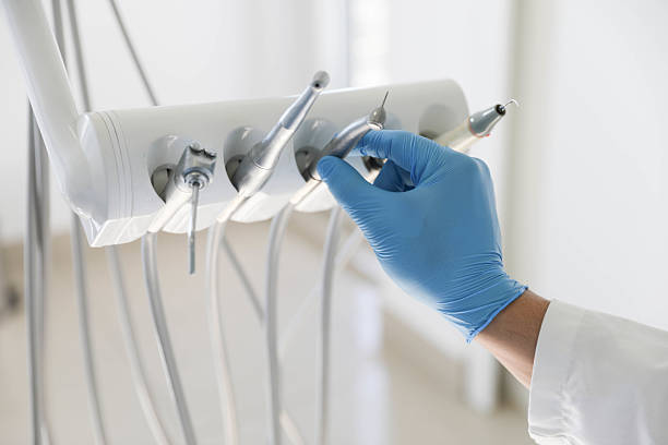Professional Tooth Extraction technician working in Robbins, NC
